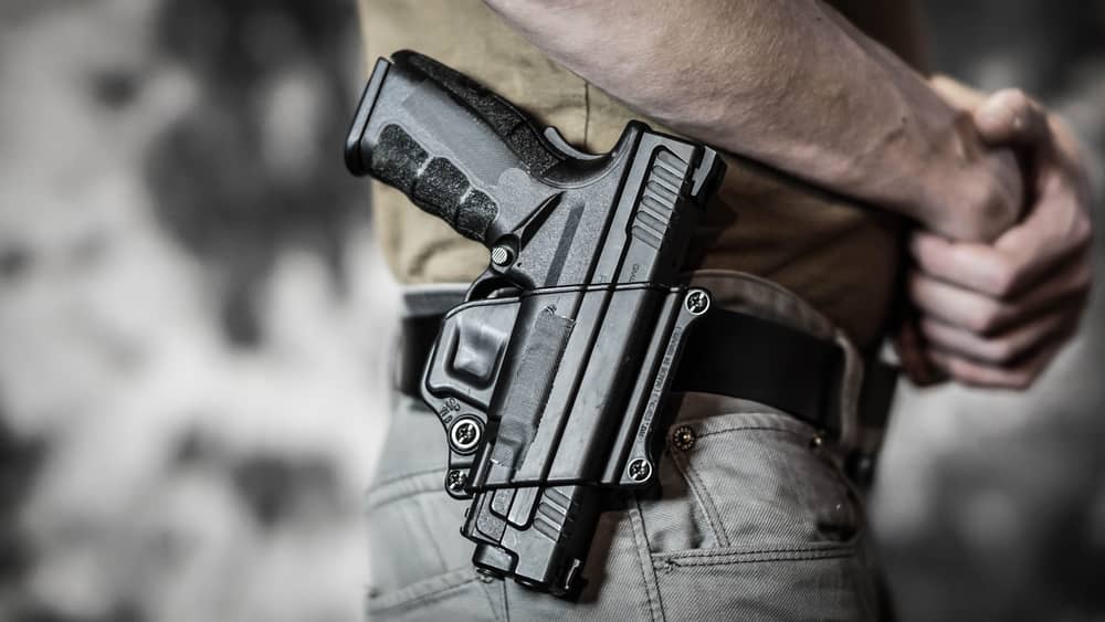 Photo of a Man Openly Carrying a Pistol