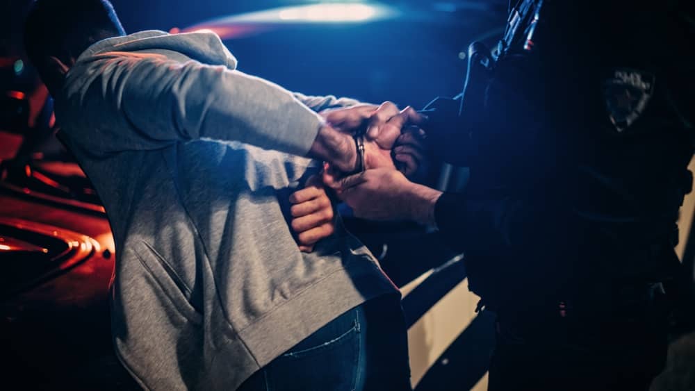 Photo of Arresting a Man